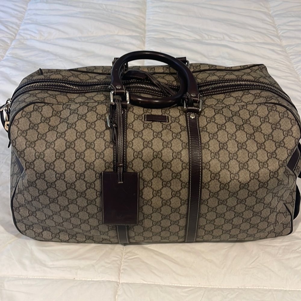 Gucci duffle bag with wheels